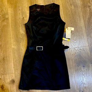 Black cocktail dress with rhinestone belt buckle